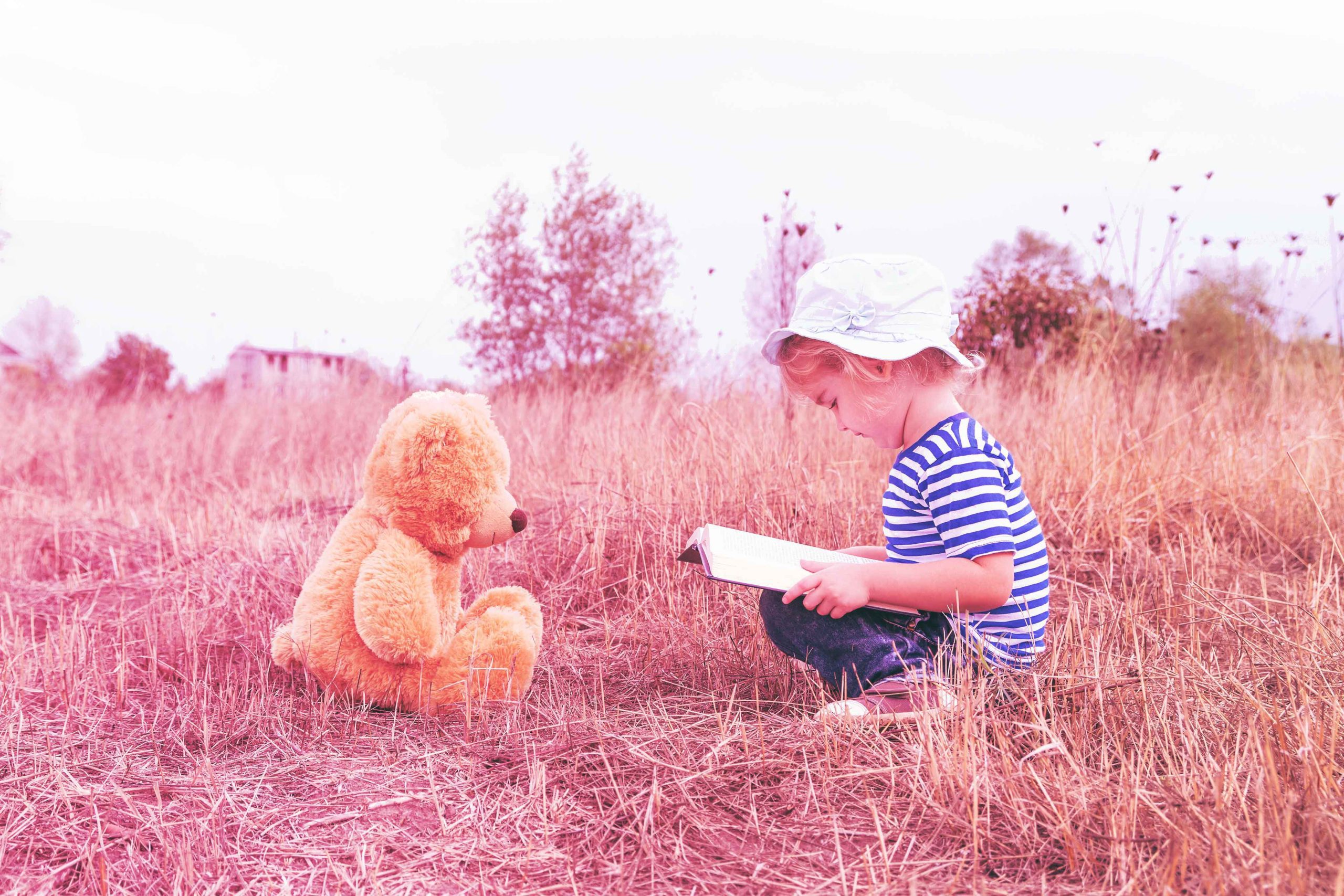 brand storytelling communications blog header image of child reading story