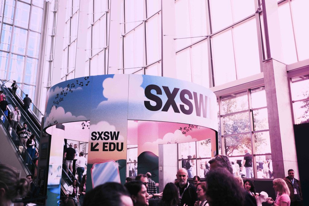 image of SXSW crowd and header