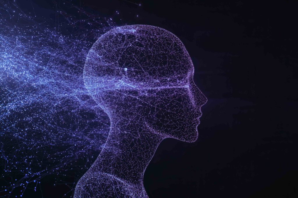 image of Abstract floating particles form a human silhouette