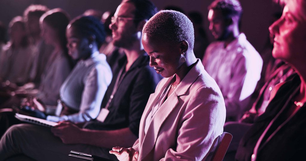 image of woman at finance conference