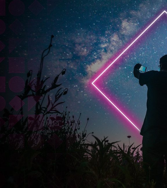 image of person taking photo of sky neon shapes Hotwire work