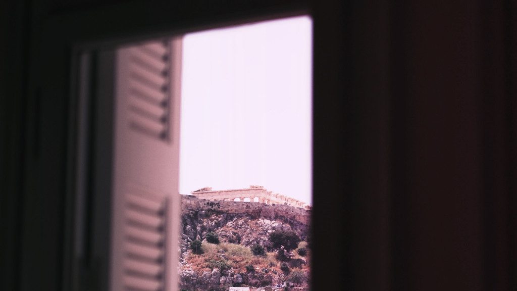 The Acropolis in Athens, through a window.