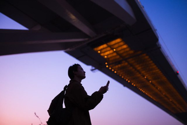 image of: Man Smartphone Bridge